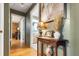 Hallway with hardwood floors, leading to bedrooms and bathrooms at 24678 Augusta Hwy, Cottageville, SC 29435