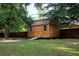 Wooden shed with double doors and windows in a backyard at 24678 Augusta Hwy, Cottageville, SC 29435