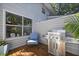 Cozy patio with a grill, comfortable seating, and lush greenery at 252 Howle Ave # C3, Charleston, SC 29412