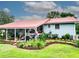 Backyard landscape design showing off a colorful display of plants and flowers that makes the perfect outdoor space at 274 Harvest Rd, Moncks Corner, SC 29461