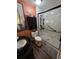Bathroom features a modern vanity, toilet, and glass-enclosed shower with marble-style tile at 274 Harvest Rd, Moncks Corner, SC 29461