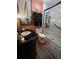Bathroom features a modern vanity, toilet, and glass-enclosed shower with marble-style tile at 274 Harvest Rd, Moncks Corner, SC 29461