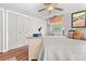 Bright bedroom with a comfortable bed, neutral decor, and large closet doors at 274 Harvest Rd, Moncks Corner, SC 29461
