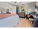 Bedroom featuring hardwood floors, a ceiling fan, and a comfortable chair at 274 Harvest Rd, Moncks Corner, SC 29461