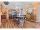 Charming dining room features a decorative chandelier and ample seating at 274 Harvest Rd, Moncks Corner, SC 29461