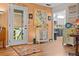 Inviting entryway with a decorative rug, accent furniture, and view to the kitchen at 274 Harvest Rd, Moncks Corner, SC 29461