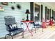 Charming porch with black iron seating and decor creates a relaxing outdoor space at 274 Harvest Rd, Moncks Corner, SC 29461
