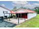 Detached two-car garage with adjoining carport adds lots of parking and storage at 274 Harvest Rd, Moncks Corner, SC 29461