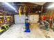 Spacious garage interior with ample storage, work space, and a well-lit environment at 274 Harvest Rd, Moncks Corner, SC 29461