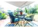 Charming covered patio with comfortable seating, perfect for enjoying the outdoors at 274 Harvest Rd, Moncks Corner, SC 29461