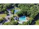 Aerial view of community pool, tennis courts and lush landscaping at 339 Mount Royall Dr, Mount Pleasant, SC 29464