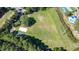 Aerial view of a sports field with soccer goals, a baseball field, and surrounding trees at 339 Mount Royall Dr, Mount Pleasant, SC 29464
