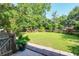 Lush backyard with privacy fence, mature trees, and room to play and entertain at 339 Mount Royall Dr, Mount Pleasant, SC 29464