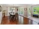 Dining room featuring hardwood floors, a modern chandelier, and views to the outside at 339 Mount Royall Dr, Mount Pleasant, SC 29464