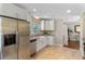 Bright kitchen features stainless steel appliances, granite countertops, and white cabinets at 339 Mount Royall Dr, Mount Pleasant, SC 29464