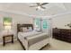 Bedroom with a trey ceiling, a ceiling fan, and natural light from two windows at 339 Mount Royall Dr, Mount Pleasant, SC 29464