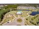 Aerial view of community featuring a lake, walking trail, pool and playground area at 364 Deep River Rd, Summerville, SC 29486