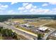 A high angle view showcases a busy commercial area with diverse businesses and a road system at 364 Deep River Rd, Summerville, SC 29486