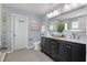 Bathroom with dual vanity, large mirror, and modern fixtures at 364 Deep River Rd, Summerville, SC 29486