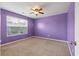 Charming bedroom with a ceiling fan, soft carpet, and a window offering natural light at 364 Deep River Rd, Summerville, SC 29486