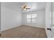 Cozy bedroom with a ceiling fan, neutral walls, and a sun-filled window at 364 Deep River Rd, Summerville, SC 29486