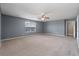 Spacious bedroom featuring soft carpet, neutral gray walls, and a ceiling fan at 364 Deep River Rd, Summerville, SC 29486