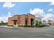 Charming brick Starbucks building with inviting outdoor seating and a well-maintained landscape at 364 Deep River Rd, Summerville, SC 29486