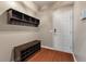 Welcoming entryway with coat hooks, shoe storage, and a secure smart lock at 364 Deep River Rd, Summerville, SC 29486