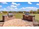 Brick-paved grilling station with two outdoor grills provides space to enjoy neighborhood picnics at 364 Deep River Rd, Summerville, SC 29486