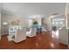 Bright living room featuring hardwood floors, stylish decor, and an open floor plan at 364 Deep River Rd, Summerville, SC 29486