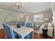 Bright living and dining area featuring hardwood floors, neutral walls, and a large window at 364 Deep River Rd, Summerville, SC 29486