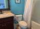 Bathroom featuring a vanity, toilet, and shower/tub combo with a white shower curtain at 3808 Tupelo Branch Row, Mount Pleasant, SC 29429