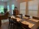 Bright dining room with ample natural light, a dining table, and comfortable seating at 3808 Tupelo Branch Row, Mount Pleasant, SC 29429