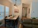 Cozy dining room featuring modern lighting, a dining table, and hardwood floors at 3808 Tupelo Branch Row, Mount Pleasant, SC 29429
