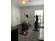 Home gym featuring workout equipment, including elliptical, exercise bike, and weights at 3808 Tupelo Branch Row, Mount Pleasant, SC 29429