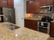 Well-equipped kitchen featuring granite countertops, stainless steel appliances, and plenty of storage at 3808 Tupelo Branch Row, Mount Pleasant, SC 29429