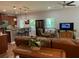 Cozy living room featuring comfortable seating, a ceiling fan, and modern decor at 3808 Tupelo Branch Row, Mount Pleasant, SC 29429