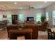 Spacious living room with comfortable seating, a ceiling fan, and plenty of natural light at 3808 Tupelo Branch Row, Mount Pleasant, SC 29429