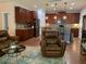 Open-concept living space connecting the kitchen and living room, with modern finishes and comfortable seating at 3808 Tupelo Branch Row, Mount Pleasant, SC 29429