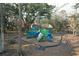 Community playground with slides, climbing wall, picnic table, and seating at 3808 Tupelo Branch Row, Mount Pleasant, SC 29429
