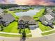 Beautiful aerial view of a suburban home near a serene lake at 438 Flat Rock Ln, Summerville, SC 29486