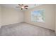 A bright bedroom features neutral walls, carpeting, and a ceiling fan at 438 Flat Rock Ln, Summerville, SC 29486