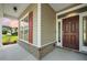 Charming covered front porch and a stylish, sturdy front door at 438 Flat Rock Ln, Summerville, SC 29486