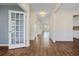 Elegant hallway with beautiful laminate flooring and neutral wall colors at 438 Flat Rock Ln, Summerville, SC 29486