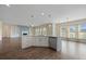 Bright kitchen featuring a center island, stainless steel appliances, and hardwood flooring at 438 Flat Rock Ln, Summerville, SC 29486