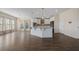 Gourmet kitchen features a center island, stainless appliances, and ample counter space, perfect for culinary enthusiasts at 438 Flat Rock Ln, Summerville, SC 29486