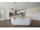 Well-appointed kitchen featuring a large island, modern appliances, and ample storage for a functional cooking space at 438 Flat Rock Ln, Summerville, SC 29486