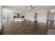 Spacious open-concept living area with hardwood floors, leading into a well-equipped kitchen, perfect for entertaining at 438 Flat Rock Ln, Summerville, SC 29486