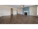 Spacious living room featuring a fireplace with built in bookshelves and hardwood floors at 438 Flat Rock Ln, Summerville, SC 29486