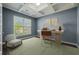 Stylish office space featuring coffered ceilings, ample natural light, and neutral tones for a productive work environment at 438 Flat Rock Ln, Summerville, SC 29486